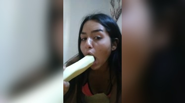 This 18-year-old slut deep throats a cucumber